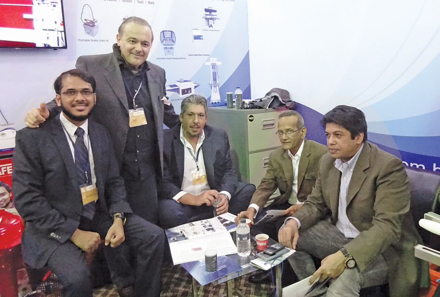 Md. Faruk Hossen Sarker (1st from left), CEO, Wintex Resources Limited; and Sergio Gori (2nd from left), Commercial Managing Director and Co-owner, FK Group with customers at the Wintex booth