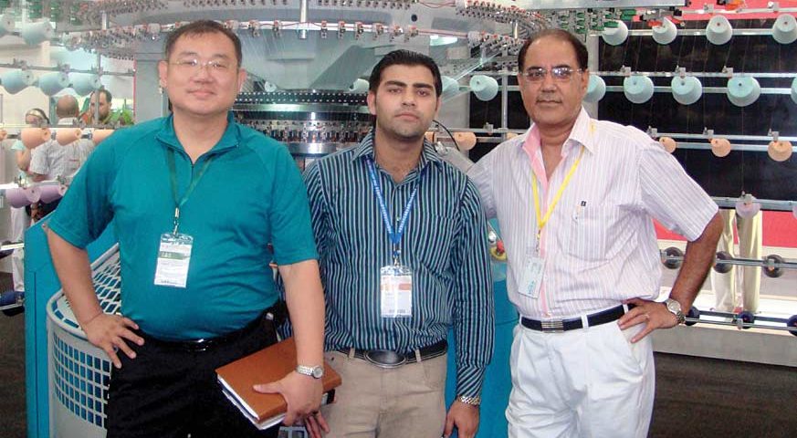 Eric Fu.Deputy Manager,Pai Lung Machinery with Indian representatives,Shamal Dhingra and his father from Virka Textiles