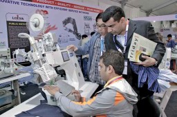 Wicrant Gambhir, GM – QA, PPC & SNS, Lifestyle International looks on while Anshuman Dash of Loiva Intech operates a machine