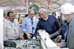 Viraf Turel (L), Chairman, EH Turel & Company with Virender Uppal, Chairman, Richa Global Exports talking about a technology