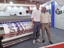 Will Qian (L), Sales Manager, Atexco assures excellent after-sales service to their customers 