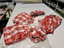 All the baby bags ready to be put inside a mother bag; (inset) a bar code label to be put on the baby bags