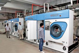 PERC dry cleaning machines, an essential part of the company's washing department, not only ensures a stain-free product but also saves on water
