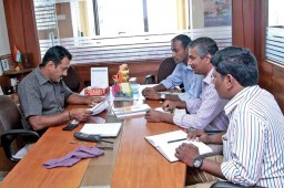 N. P. Elango, Director Marketing, seen with his team during a daily meeting session