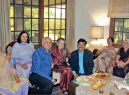 Mrs. Singh shares a happy moment with a few old timers