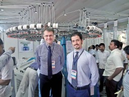 Federico Barsi (right) with Gianpiero Valsecchi, Sales Area Manager for Santoni, with sinker free knitting machine – Atlas HS