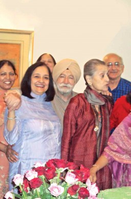 Devinder, Mr. Singh, Mrs. Singh and Anil Chokra celebrate