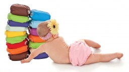 baby-girl-with-stack-of-diapers copy copy