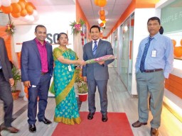Ariel Miranda, Managing Director, SGS Bangladesh being welcomed to the new lab at Chittagong with flowers; also seen are Rajendran Ramasamy, Business Manager, CTS, SGS Bangladesh (extreme right)