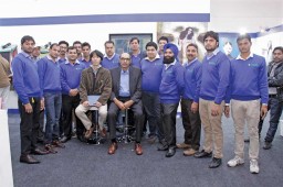 Yushuhiro Morimoto, Assistant Manager, Knitting Machine Sales Section, Shima Seiki; Ashwani Behl, President, Janaksons Intl.; and Vaibhav Behl, VP, Janaksons Intl. surrounded by the Janakson’s team