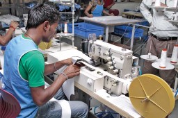 Kansai sewing machine with an attachment for placket sewing