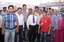 Jatinder Sudera (centre with necktie) of PK International with clients and his team after a successful fair
