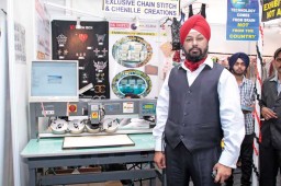 Supreet Singh Luthra, MD, SK Impex with the MAGICFIX VT-141M rhinestone fixing machine from VisionTech