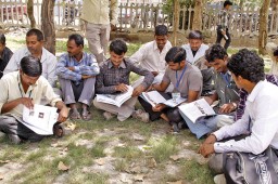 Workers curiously go through Apparel Online Hindi, after the play