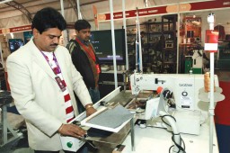 Jay Nugessur, Managing Director Sales & Technical Engineer, Sipami, demonstrating automatic programmable multi-functions unit on 326G-SP5 machine