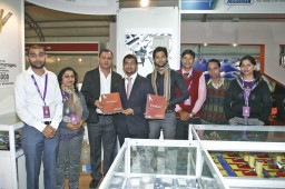 M.L. Jain (3rd from Left), M.D. Mahaveer/Gauge with his team at a book launch ceremony at the fair