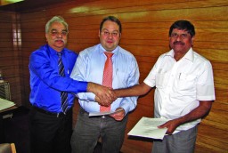 Vikram Sona, Area Sales & Marketing Manager South Asia, Duerkopp Adler, India; M. Bacman, Sales & Marketing Manager, Asia, Duerkopp Adler; and C. Subramaniam, Chairman, Mehala Machines at the signing of the agreement