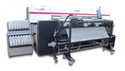 Mimaki’s Tx400-1800B textile inkjet printer with adhesive belt carrier system