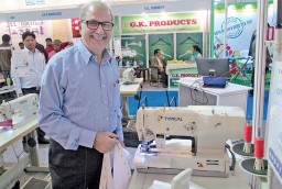 Viraf E. Turel, MD, EH Turel & Company with Typical’s High Speed Electronic Crew-Cut Buttonholing Machine