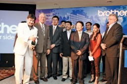 Randeep Sahni, AGM, Brother International, opens the Champagne while Madhu Kapoor, MD, ALT, Yoshomi Ito, Manager, Toshiaki Yamada, Director, Brother and Rakesh Vaid, Chairman, AEPC watch 