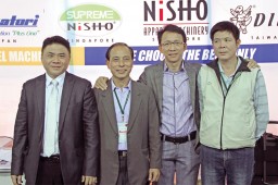 Foo Toon Pow, Managing Director, Focus Garmentech (2nd from right) with his team