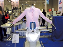 The new blouse finishing machine holds the seam of the blouse while steaming