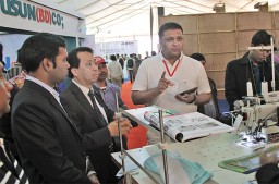 Maashed Abdullah, Director, Dressman enquiring about the sewing solutions from Ngai Shing
