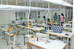 The unit with 19 machines is run by 6 operators. At GCC, a denim jean has a throughput time of 4 hours