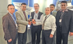 Reinhard Koehler, Area Manager, bullmer GmbH (3rd from left) presents the ‘Best Dealer’ award to M. A. Saleque, Managing Director, Uni Asia Associates (2nd from left) in the presence of Gazi Mohiuddin Ahmed, Managing Director, Wisteria Textiles (extreme left)