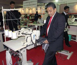 Anil Anand demonstrating HCA’s indigenous machine at his stall at the GTE