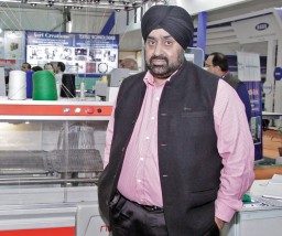 GP Singh from KP Exim with the new Aries range of flat knitting machines from Steiger