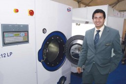 Mohit Belani, Director, Ramsons, with RAMA - India’s first Perc Dry-cleaning Machine 