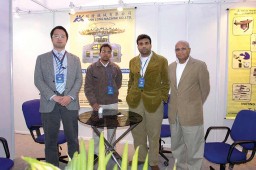(L-R) Organ Needle’s Masato Ibaraki with a customer, Udayan Khanna and Praveen Khanna