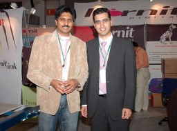 Vinod Krishnamurthy, CEO, Texsoco Technologies Pvt Ltd with Eyal Manzoor, Regional Manager Asia Pacific, Kornit- posing at the Texsoco stall