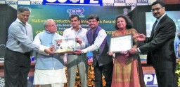 Ravi and Sujata Poddar receiving the coveted award from the Union Minister for MSME Kalraj Mishra 
