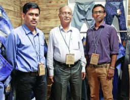 Subrata Ghosh, VP, Product & Business Development with D K Jain, Director, Nandan Denim Limited, India (C) with a colleague