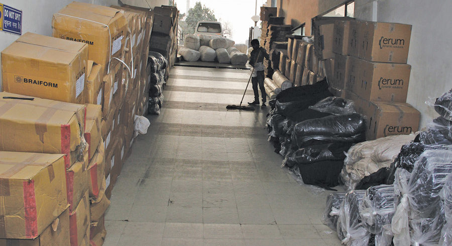 The fabric store is designed with a ramp so that the incoming fabric can be swiftly rolled into the store without any excess labour or movements