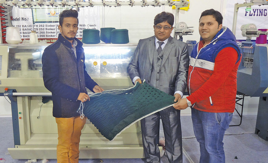 Harvinder Chauhan, Proprietor, Harvinder Knitting Solutions (second from right)