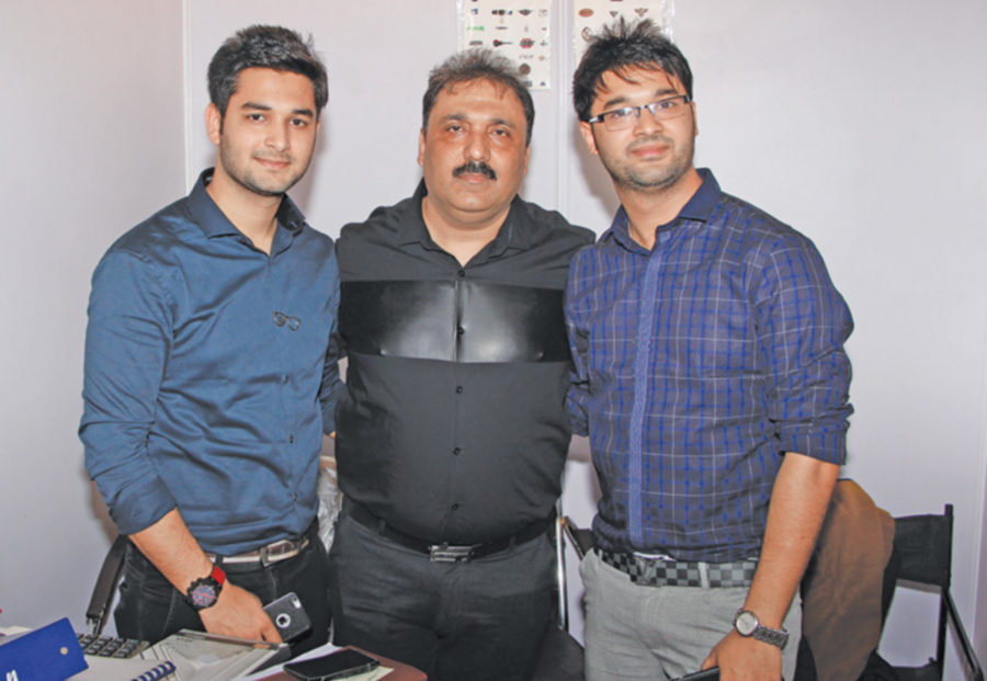 Parmod Arora of NC Traders with his sons: Nikhil (R) and Chirag 