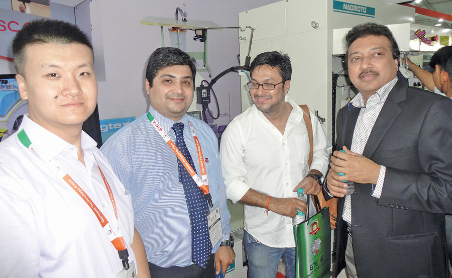 Sanjay Sethia (4th from left), MD and Ravi Shanker (3rd from left), GM – Operations of Spectra Fashions at the booth of Turel Group
