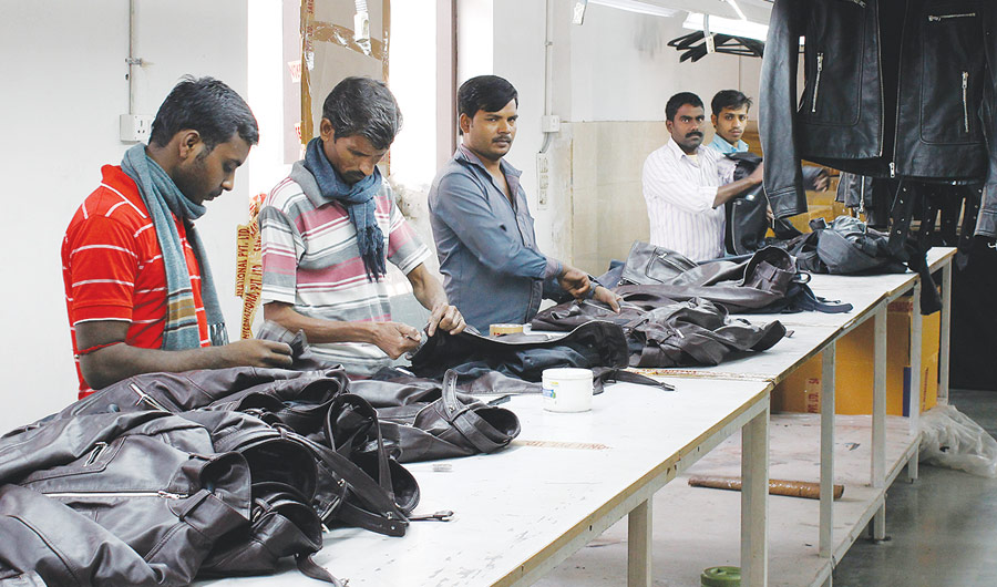 The finishing of leather jackets is a meticulous task – the rivets are attached by hand, the leather is buffed using lighter flames and Aloe Vera cream