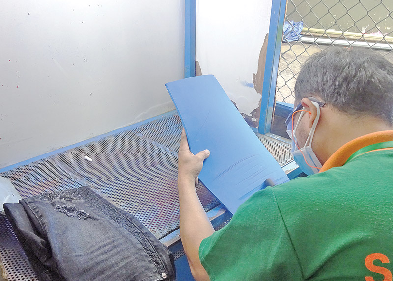 Templates, which serve as a guide for areas that must be scraped and abraded, being developed on-site