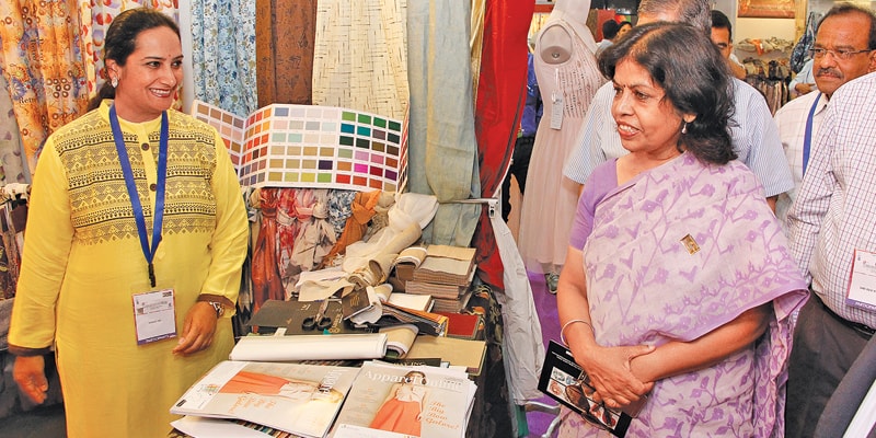 Rashmi Verma, Secretary, Ministry of Textiles (R) interacting with Roopa Srinivas of Khoday Inc