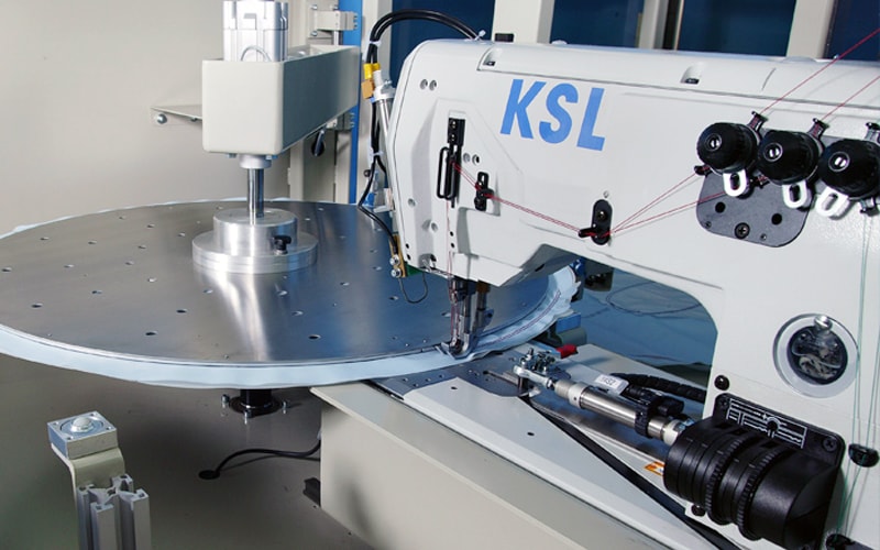 Auto Airbag Robot loads the airbag and sews around its circumference