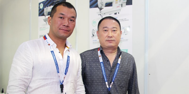 Guofu Ruan (L), General Manager with David Fish, Manager, Dxing Sewing Machine participated at GTE for the first time